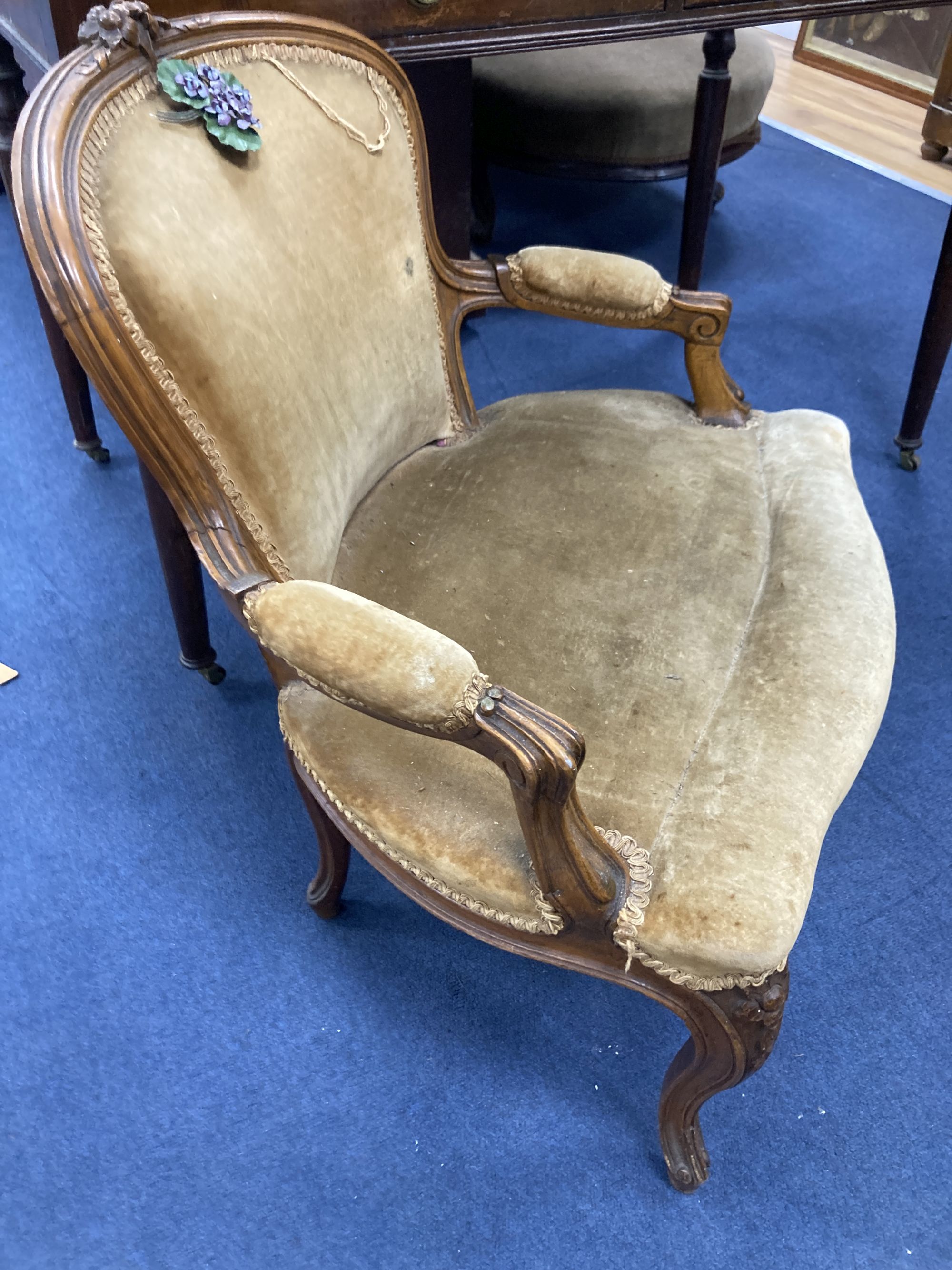 A Victorian mahogany dressing table, width 107cm, depth 58cm, height 80cm, together with a Louis XV style salon chair